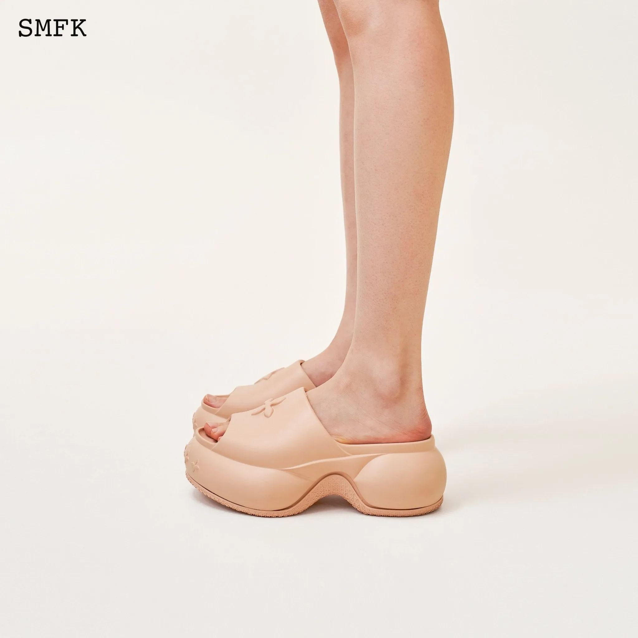 Compass Wave Platform Bumper Sandal In Nude